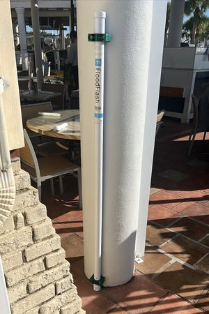 This internet-connected sensor at a restaurant in Dunedin, Fla., triggers an automatic insurance payout if flood waters reach a certain level